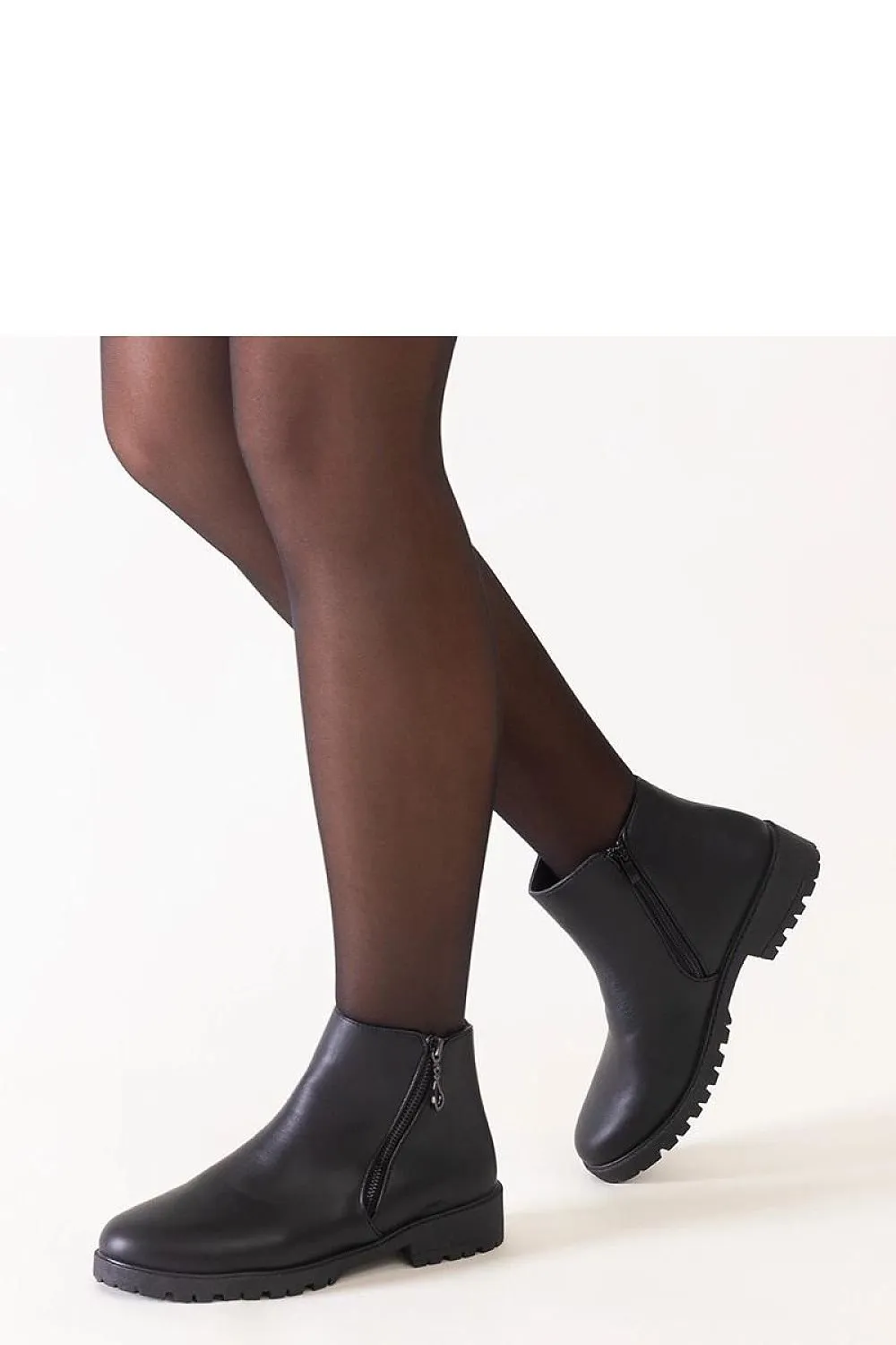 Brown ankle boots with metal inserts